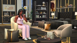 A woman sits in her fancy plush apartment in The Sims 4.
