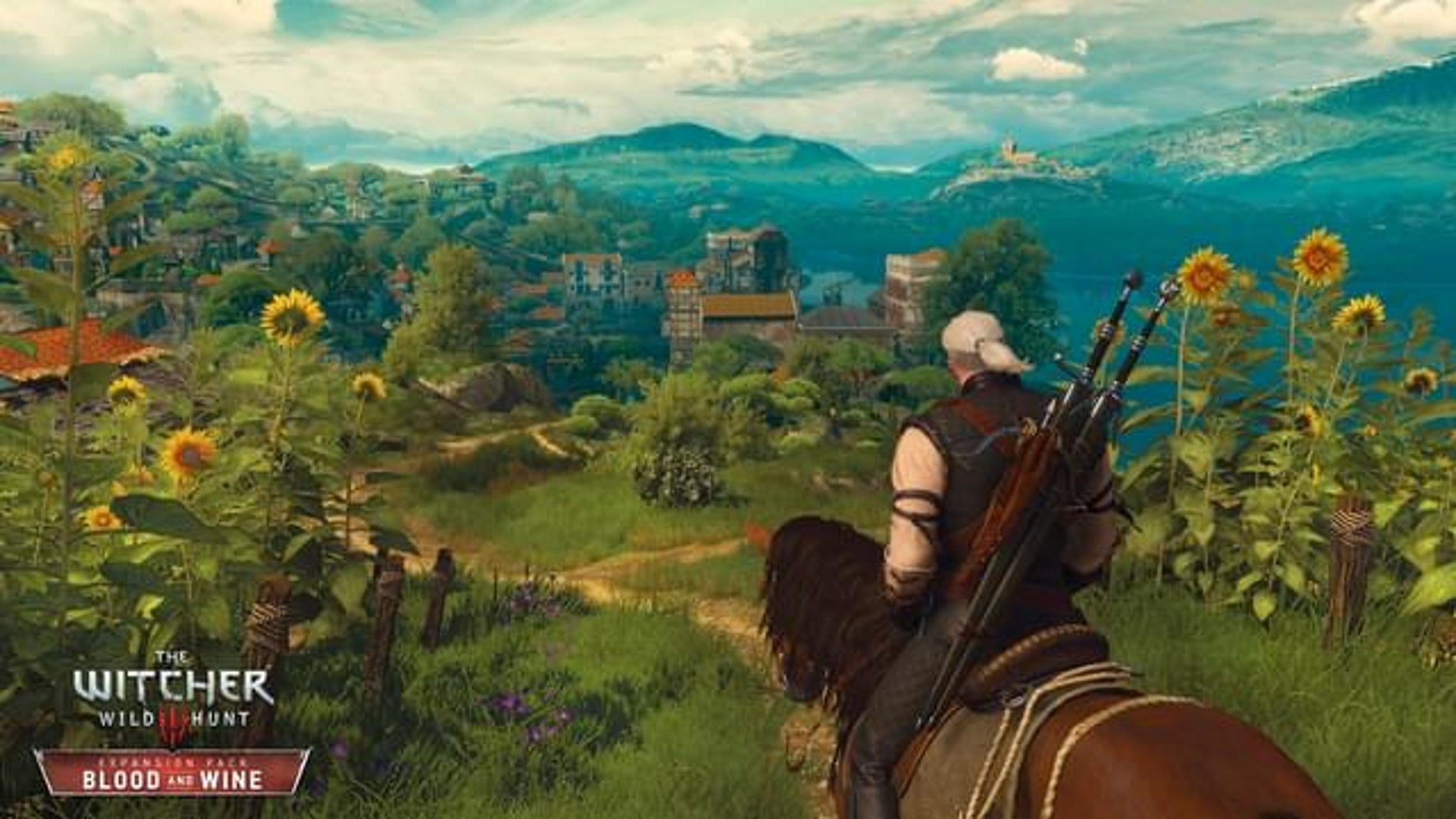 The Witcher 3 Grandmaster Feline gear locations: A man with white hair done up in a ponytail is sitting on a brown horse. They are on a hill overlooking a field of sunflowers, with a mountain range rising in the distance - 7