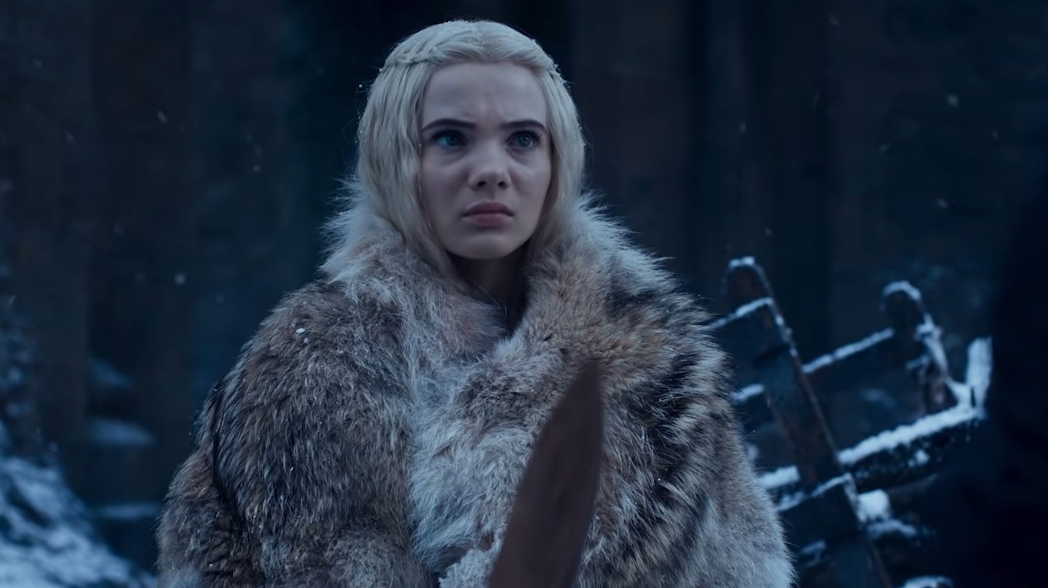 Witcher season 2 trailer - Civi holds a practice sword while looking at Geralt off camera.