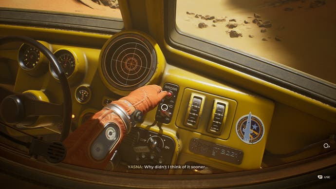 A screenshot from The Invincible, showing the yellow interior of a vintage space rover vehicle, its dashboard, and our space-suited hand and arm reaching out to flip the radar lever we see on it.
