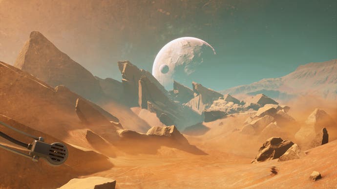 A landscape shot of an alien planet, which looks like a desert with huge, jutting rocks, and then there's a low-hanging moon in the background.