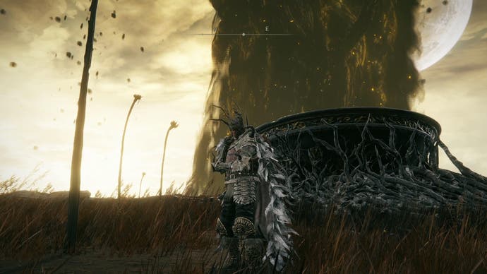 Elden Ring Shadow of the Erdtree screenshot showing player character pondering next to giant stone chalice