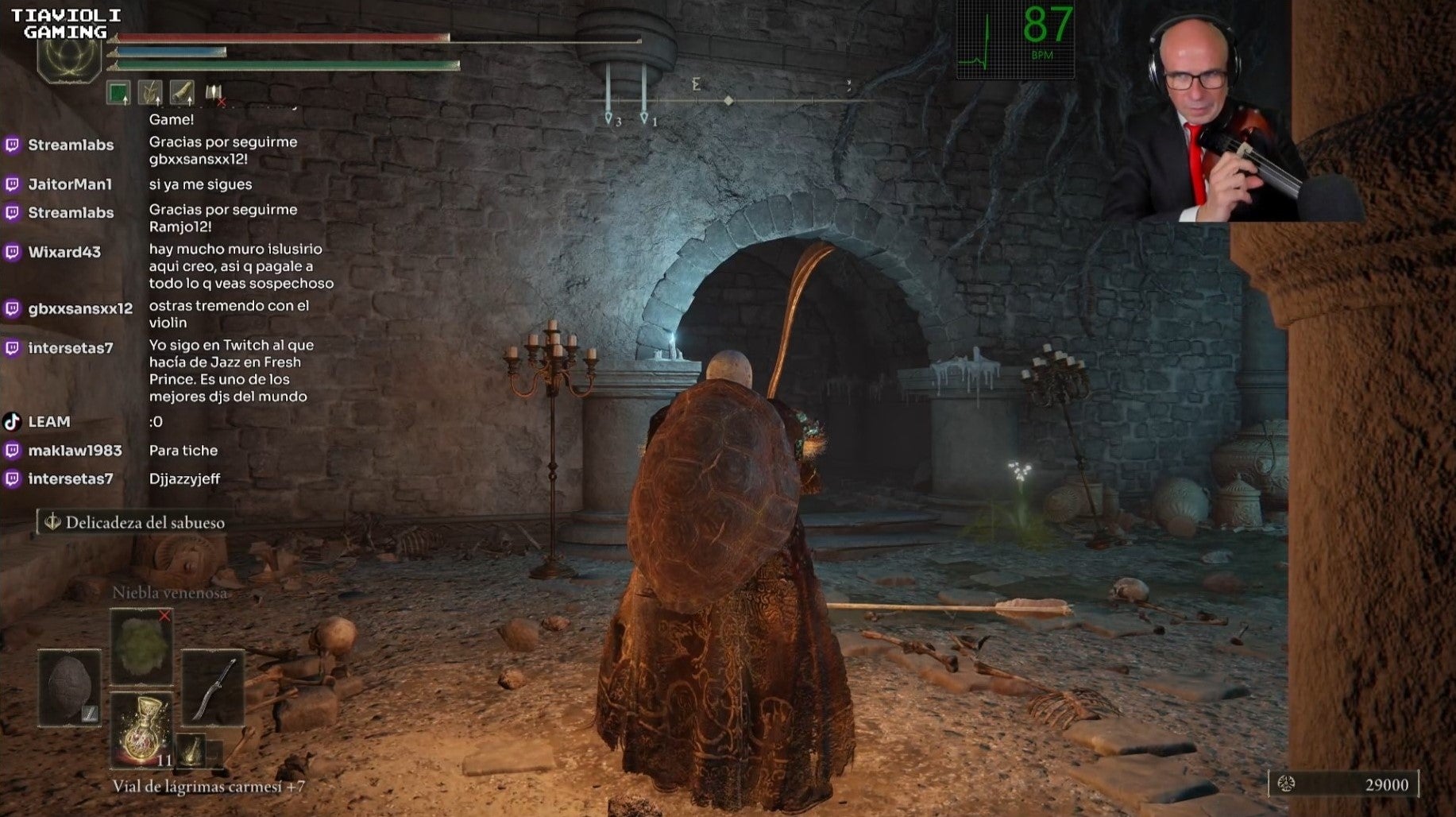 Streamer TiavioliGaming exploring a dungeon in Elden Ring, using a violin as the controller