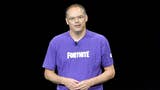 Epic CEO Tim Sweeney in purple Fortnite t-shirt on black background