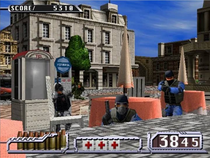 Time Crisis 2 screenshot shows four gun-toting enemies hiding behind tables and chairs in an outdoor café setting