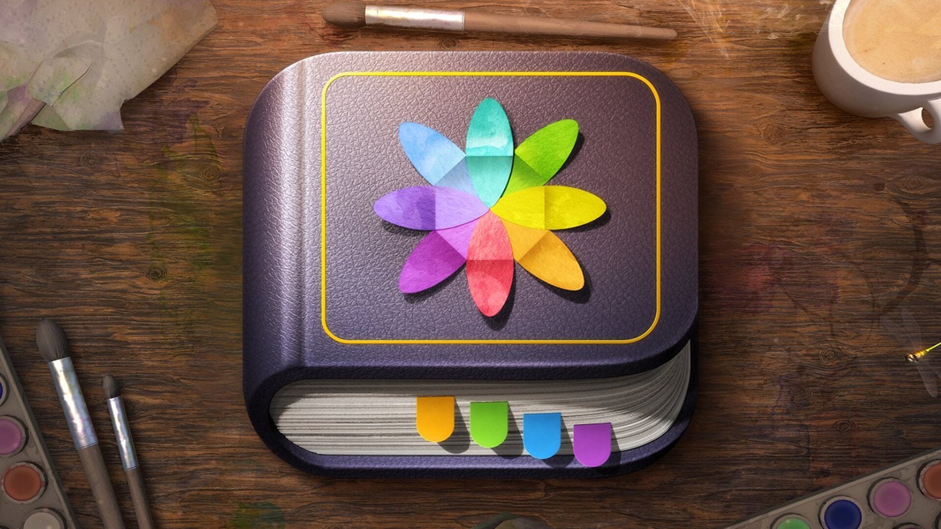 The logo for watercolour puzzle game on Apple Arcade, tint., is shown on a painter's desk - 32