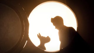 Tintin and Snowy silhouetted in a round hatch of some sort.