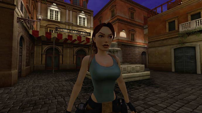 Lara stands facing the camera in an Italian plaza in Rome.
