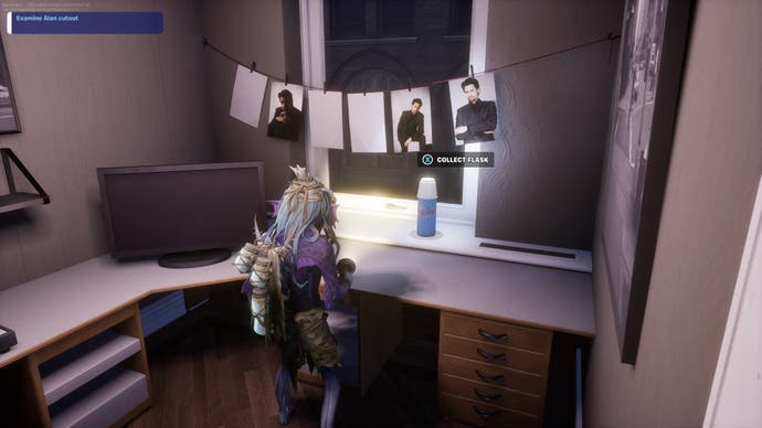 A screenshot from the Alan Wake crossover catch-up event in Fortnite. Here, Tom Phillips' fish-like avatar is in an office environment, looking at some photos that have been hung up to dry, or display. They show Alan Wake.