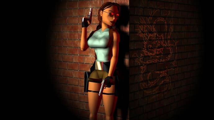 Lara Croft standing against a wall holding a pistol in artwork for Tomb Raider 2.