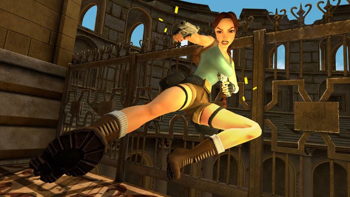 Lara Croft is diving, legs in a kicking position, dual wielding pistols pointing in the direction of her kick in Tomb Raider.