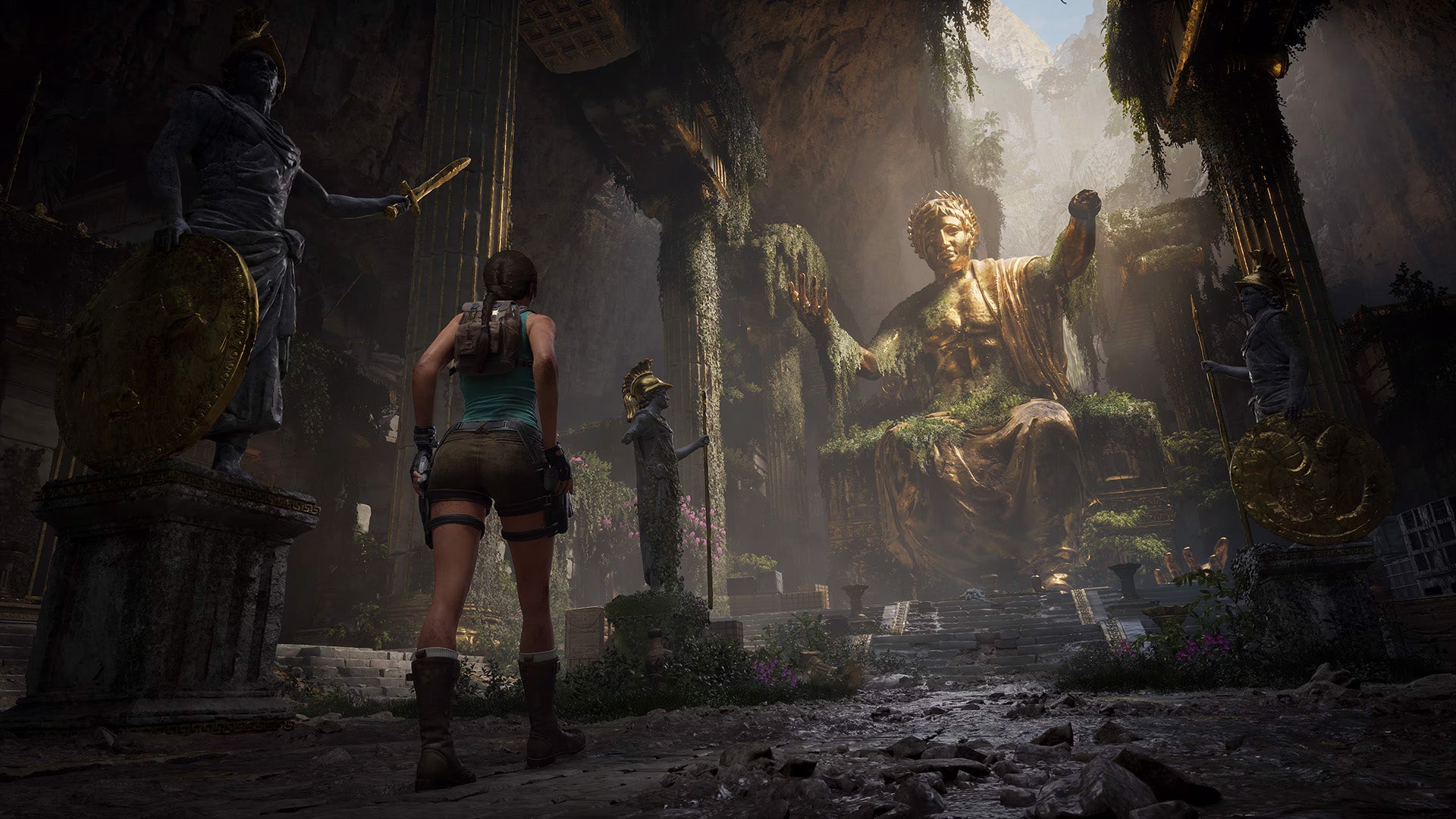A woman explores an overgrown temple with a huge, seated golden statue in it.