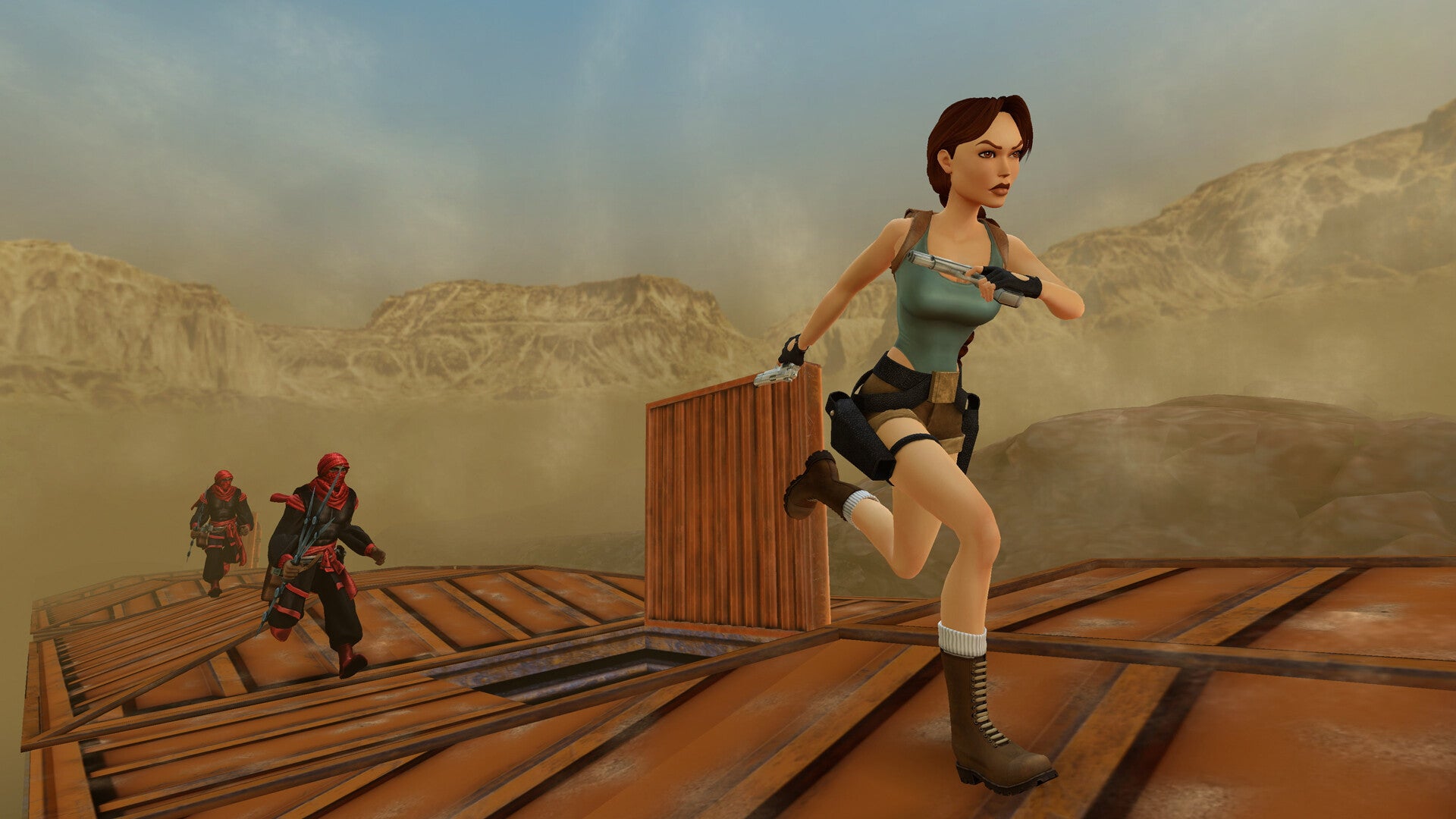 Lara Croft runs away from enemies on the roof of a moving train. - 1