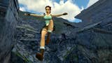 Lara Croft jumping, with rocky scenery in the background, in the Tomb Raider Remastered games.