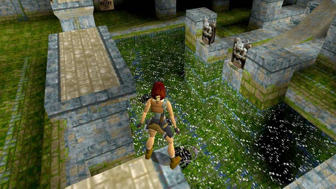 Lara Croft, standing on a pillar high up above the ground in the original Tomb Raider.