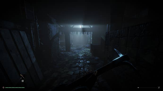 A screenshot from Total Chaos showing a murky corridor with broken tables and detritus strewn everywhere. In the nearground we see a character’s hands holding a pickaxe.