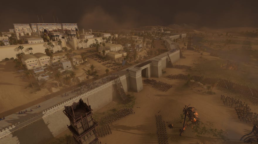 The city Men-Nefer under seige in Total War: Pharaoh, during a sandstorm