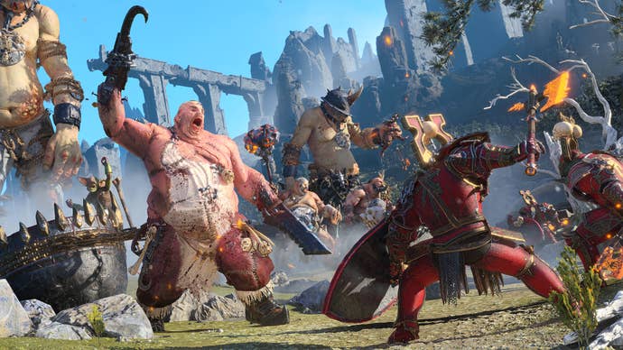 Giant ugly ogres in a screenshot of Total War: Warhammer 3’s Ogre Kingdoms DLC.