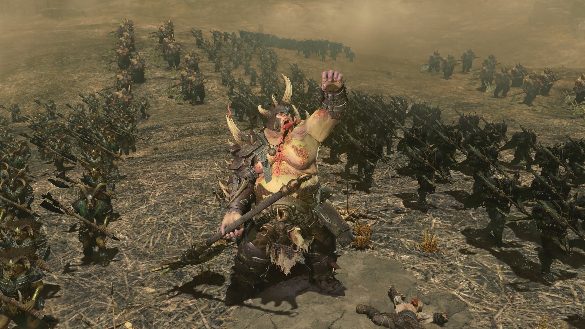 A large and friendly man made of rot and pain raises his fist in the air to herald the destruction of the Total War Warhammer 3 world. - 4