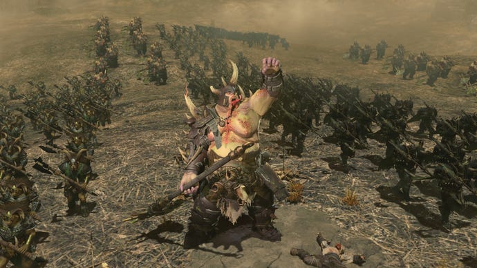A large and friendly man made of rot and pain raises his fist in the air to herald the destruction of the Total War Warhammer 3 world.