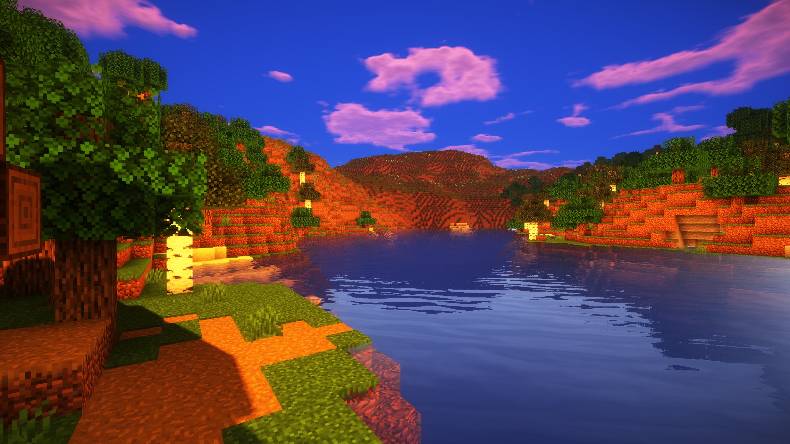 A screenshot of a river in Minecraft, with some trees on either side of the bank and a hill in the distance, taken using Triliton shaders.