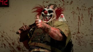 Homicidal clown Sweet Tooth stands against a blood-spattered wall with a machete over his shoulder, giving a thumbs-up.