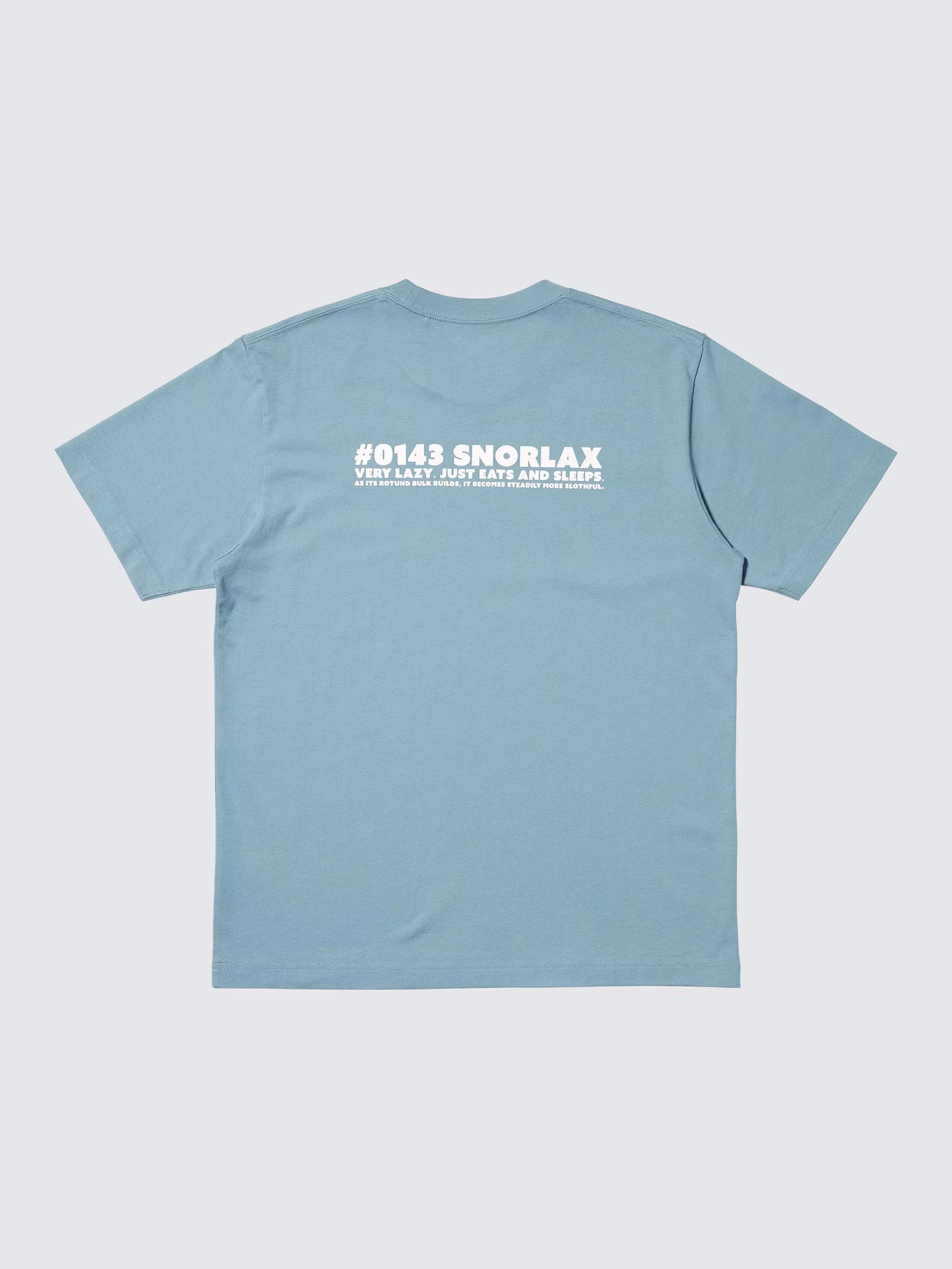 The back of a blue-grey t-shirt featuring text about the Snorlax character.
