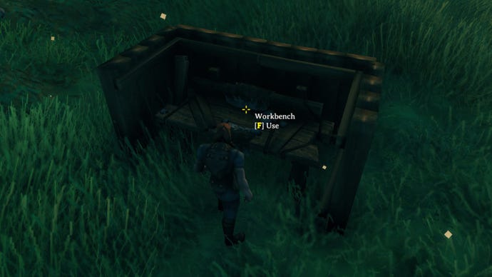A Valheim screenshot of a Workbench surrounded by four Wooden Walls in a “U” shape.