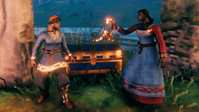 Two characters in Valheim, one of whom is holding some sort of ornamental horn.