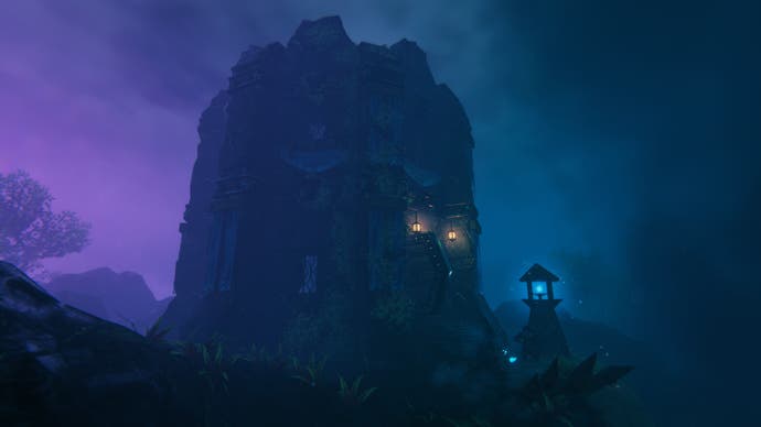 Valheim Mistlands update - a large rocky structure in dark purple and blue haze