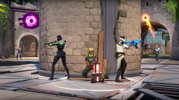 Viper and Cypher protect Raze while she defuses the spike on Valorant’s new Breeze map.