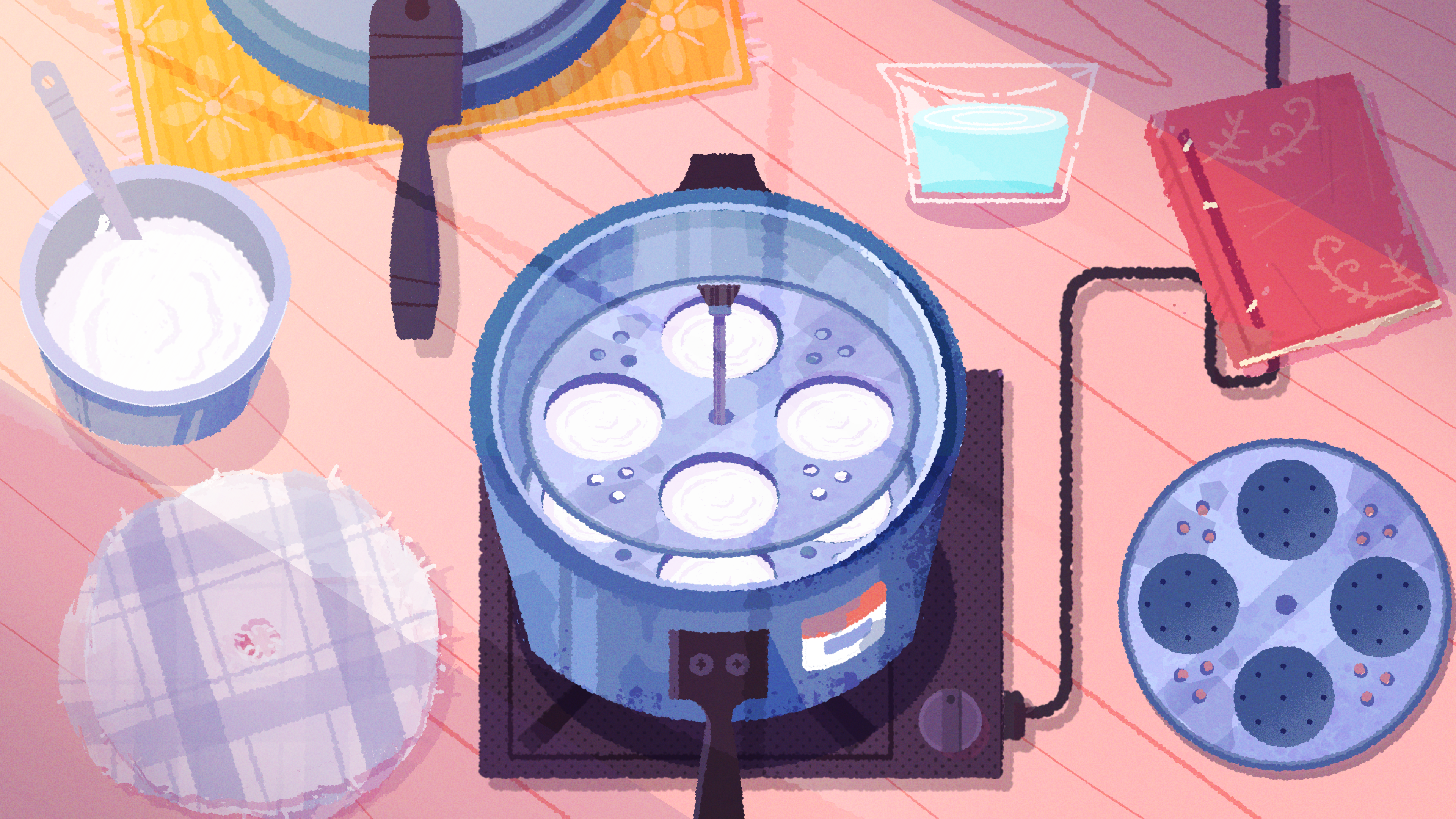 A steamer filled with trays and towels to make idli in Venba