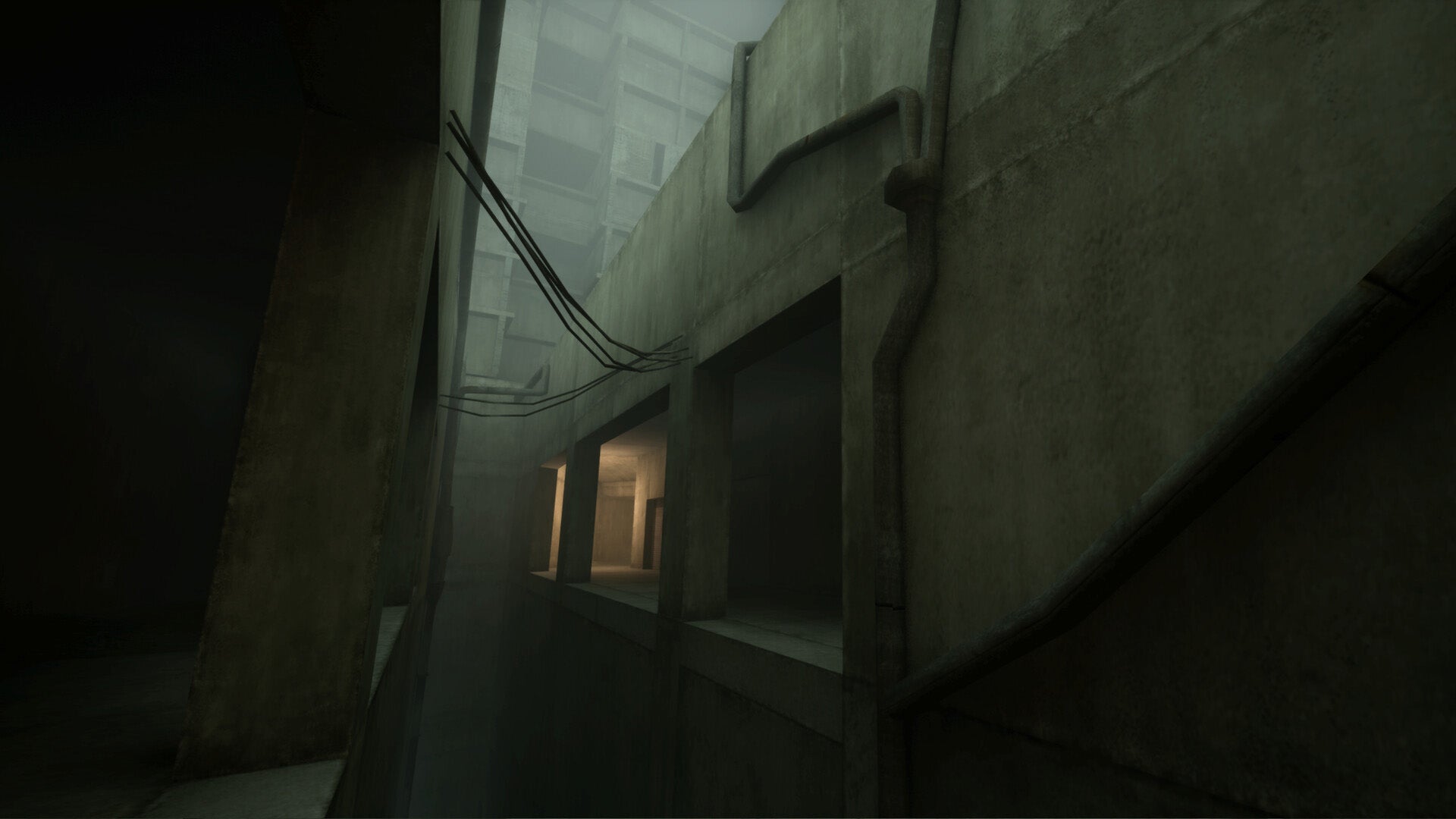 A narrow space between two concrete, brutalist buildings in VHOLUME. - 1