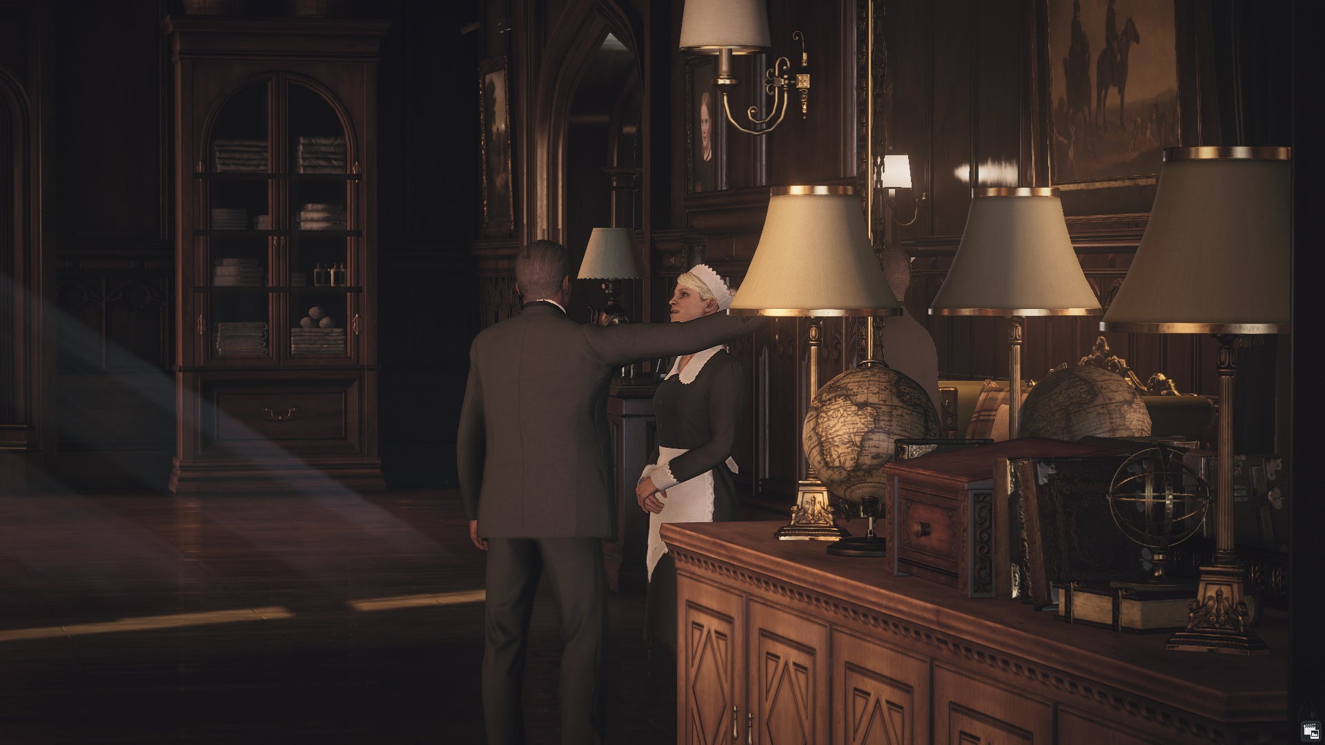 Two employees flirt during the Voyeurism mission in Hitman 3&rsquo;s Dartmoor.