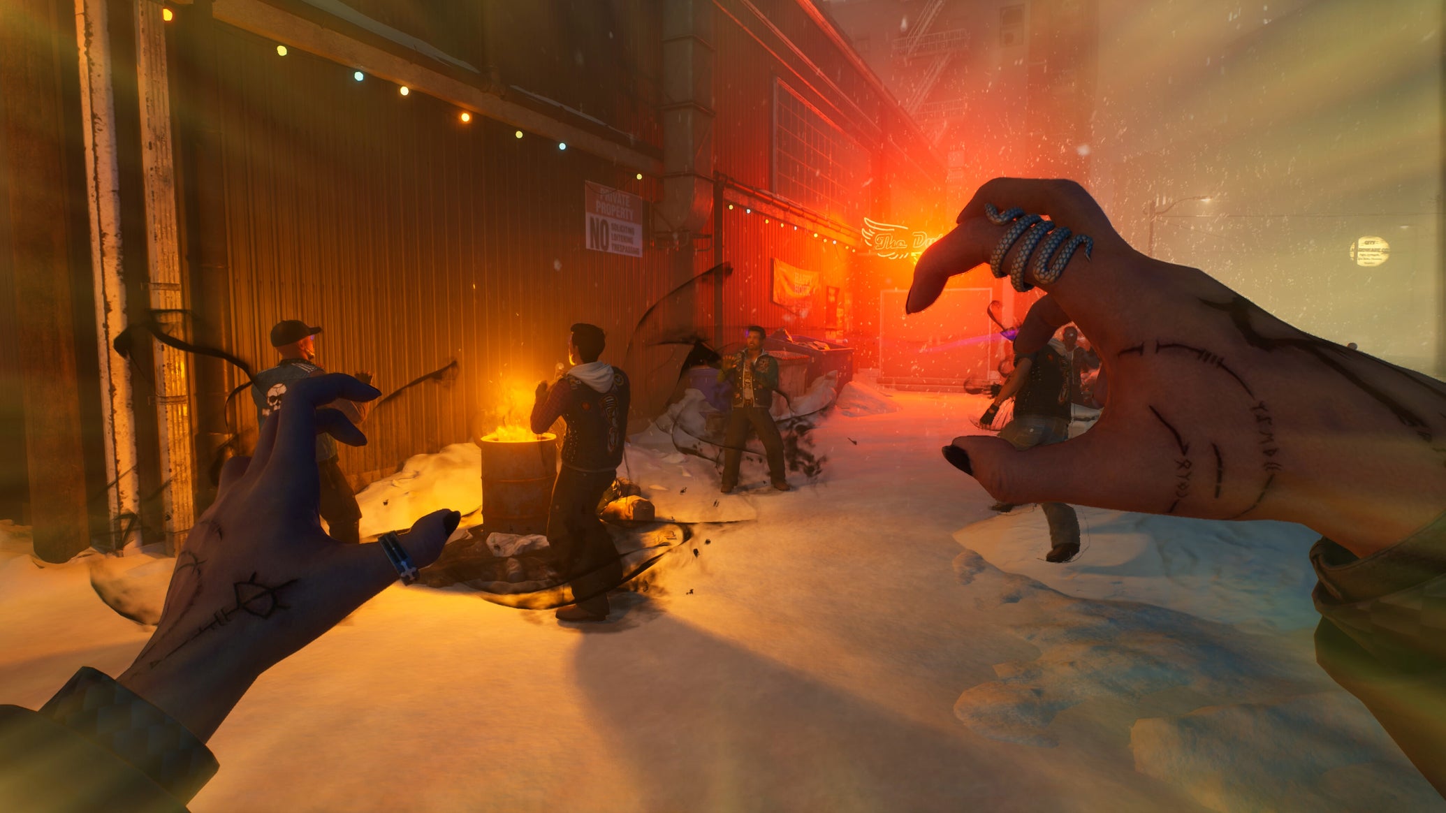 A first-person perspective of female Phyre charging up an attack, preparing to ambush some unaware mooks gathered around a flaming barrel in the snow in Vampire: The Masquerade - Bloodlines 2. - 1