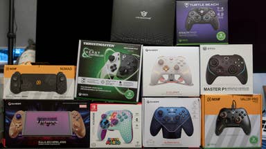 a wall of 10 different gamepads or controllers, from Scuf, GameSir, Turtle Beach and more
