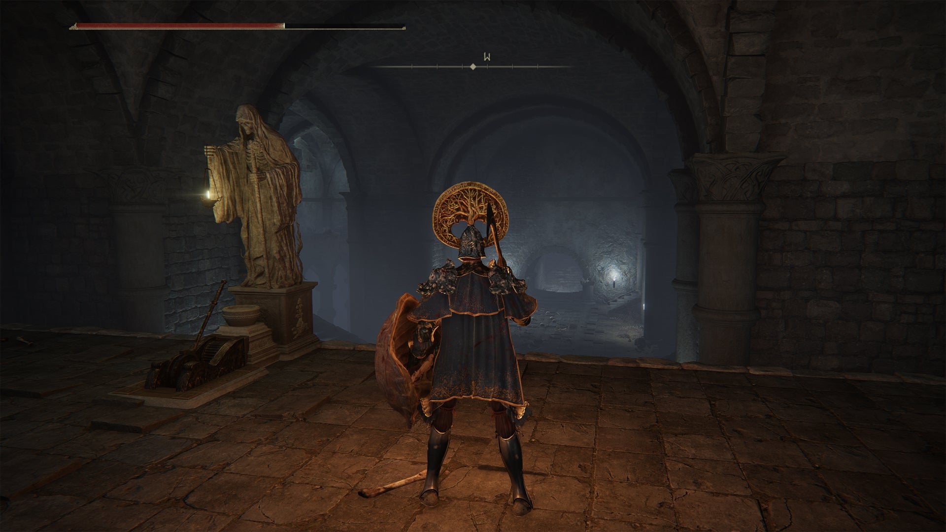 A statue and lever in the Elden Ring War-Dead Catacombs. - 8