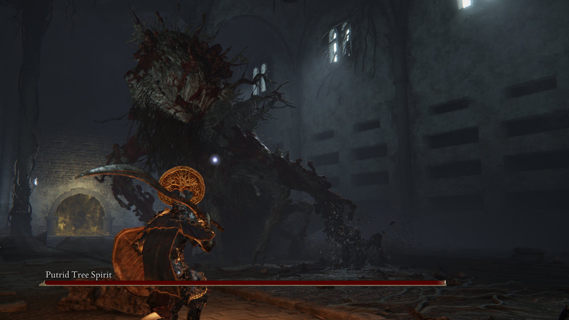 The Putrid Tree Spirit boss in the Elden Ring War-Dead Catacombs. - 9