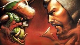 A human stares eye to eye with an orc in Warcraft: Orcs And Humans.