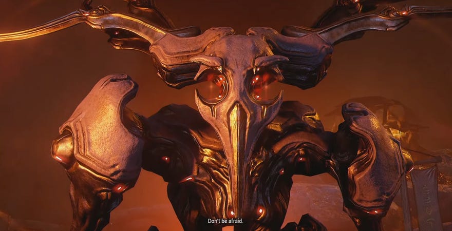 A screenshot of Warframe showing a terrible giant. The subtitle reads, “Don’t be afraid."