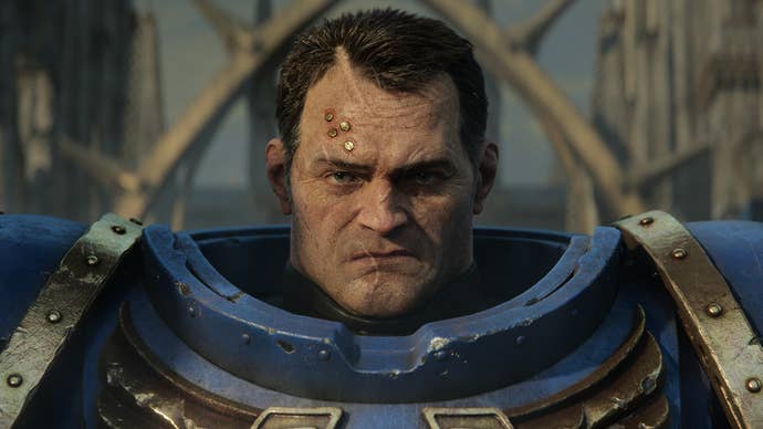 A closeup of our Ultramarine boy in Warhammer 40,000: Space Marine 2 CG artwork.