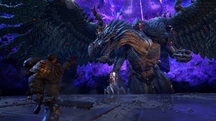 A chaos demon stares down at Titus as the space marine points a gun toward it.