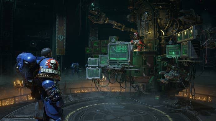 A magos surrounded by computer interfaces speaks with Titus.