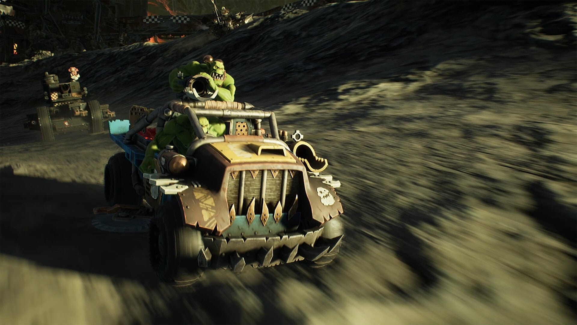 A pair of orks driving a racing truck in Warhammer 40,000: Speed Freeks. - 1