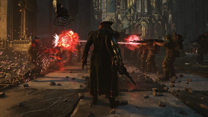 A commanding officer gives his troops a command to fire on a few prisoners.