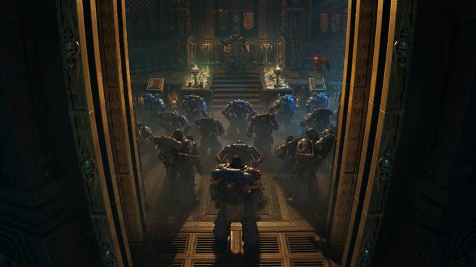 Many space marines kneel as they listen to a service by the chaplain in the ship’s chapel.