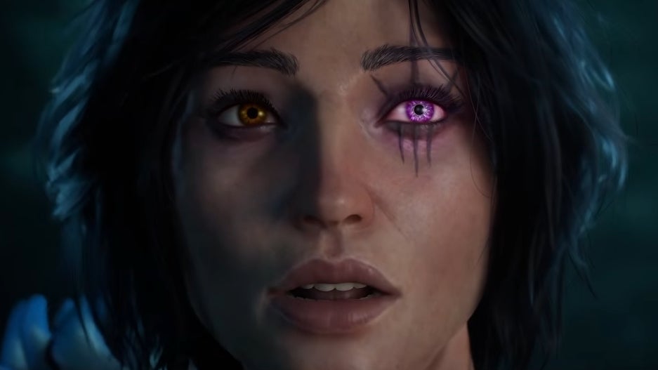 Warlock trailer screenshot showing a woman - the Warlock - with black hair, tanned skin and a magic purple eye looking shocked in close up