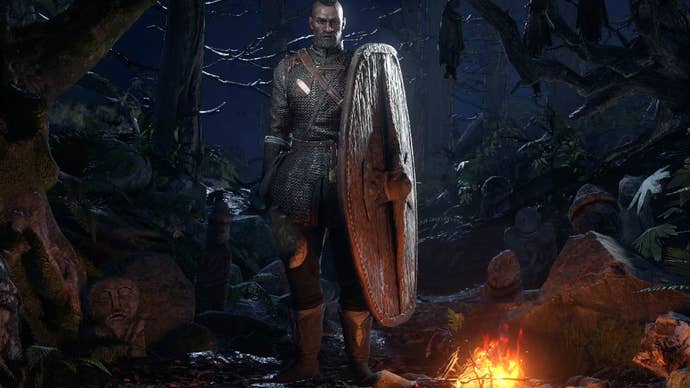 The Warrior stands by a fire in the Path of Exile 2 character select screen.