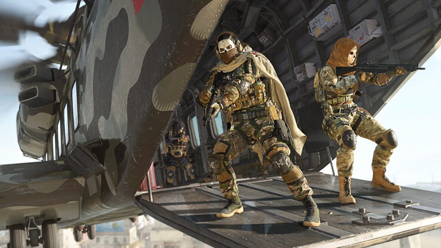 A squad looks out from the bay of their aircraft in Warzone 2.0.