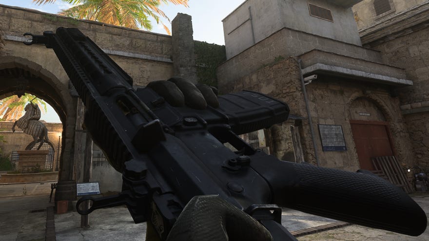 The player in Warzone 2.0 inspects their weapon, the FTAC Recon.